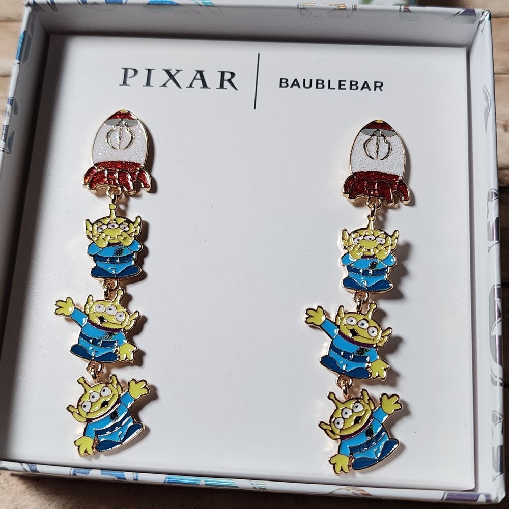 New BaubleBar Pixar Disney Toy Story Alien Dangle Earrings w/Rocketship NIB